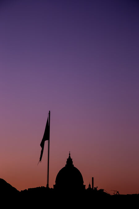 Saint Peter's dome in silhouette, Vatican City, Rome